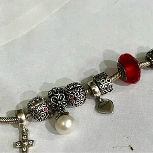 Pandora Silver and Red Bracelet with Intricate Charms